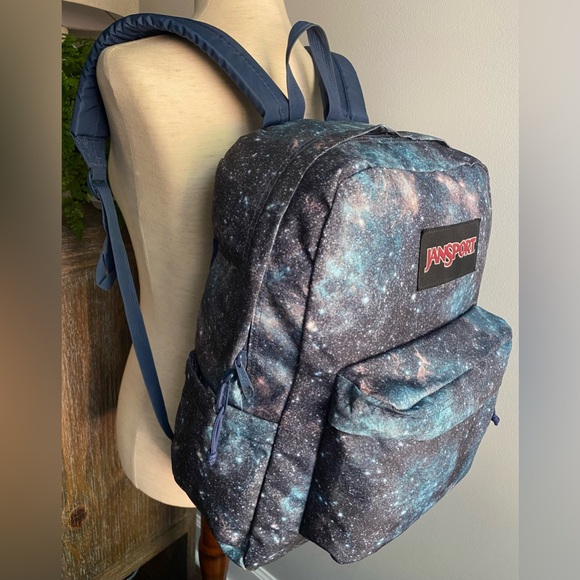 galaxy jansport backpacks Overexposed Backpack - Multi Red a front utility pocket with organizer JanSport Superbreak Backpack
